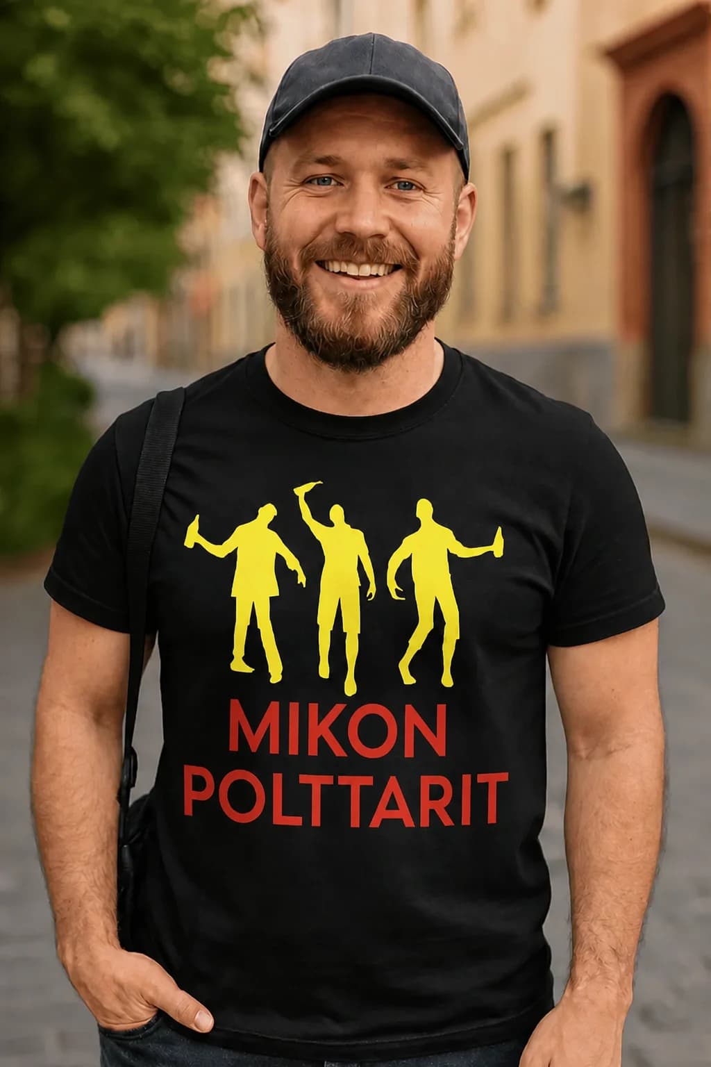 Mies mustassa polttaripaidassa, jossa kolme keltaista juhlijaa ja punainen teksti MIKON POLTTARIT