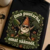 Puutarha-aiheinen t-paita tekstillä Oma puutarha, omat säännöt. ja ristissä oleva lapio ja harava.
